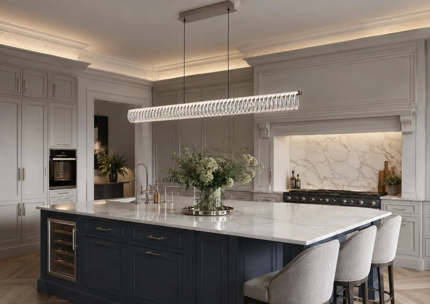 Halo pendant illuminating a considered kitchen interior